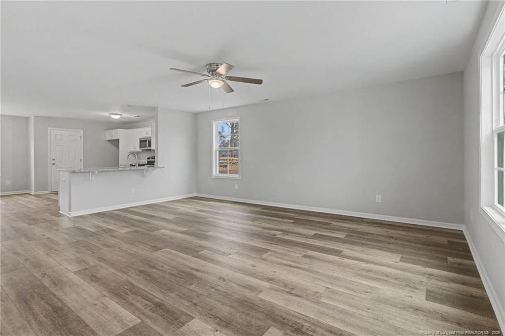 Open concept living & dining - 402 Rutherford Street, Spring Lake, NC 28390