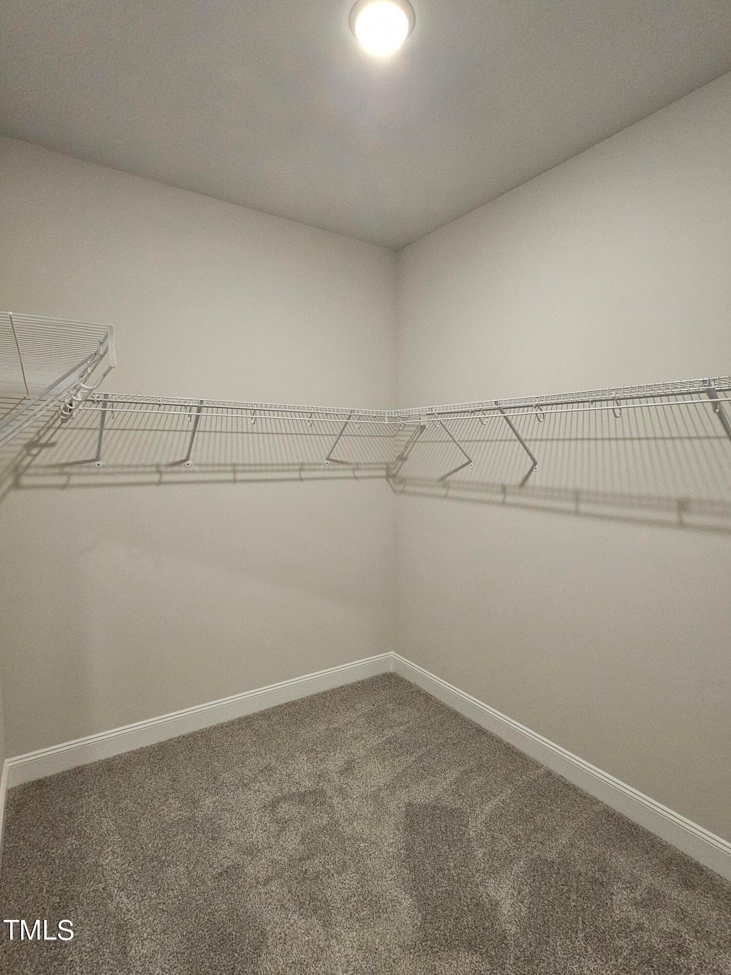 Primary walk in closet - 47 Cooper Branch Court, Fuquay Varina, NC 27526