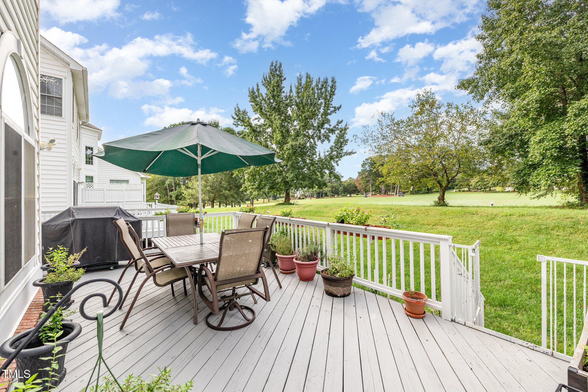 Expansive deck overlooks first fairway - 2306 Carriage Oaks Drive, Raleigh, NC 27614, Raleigh