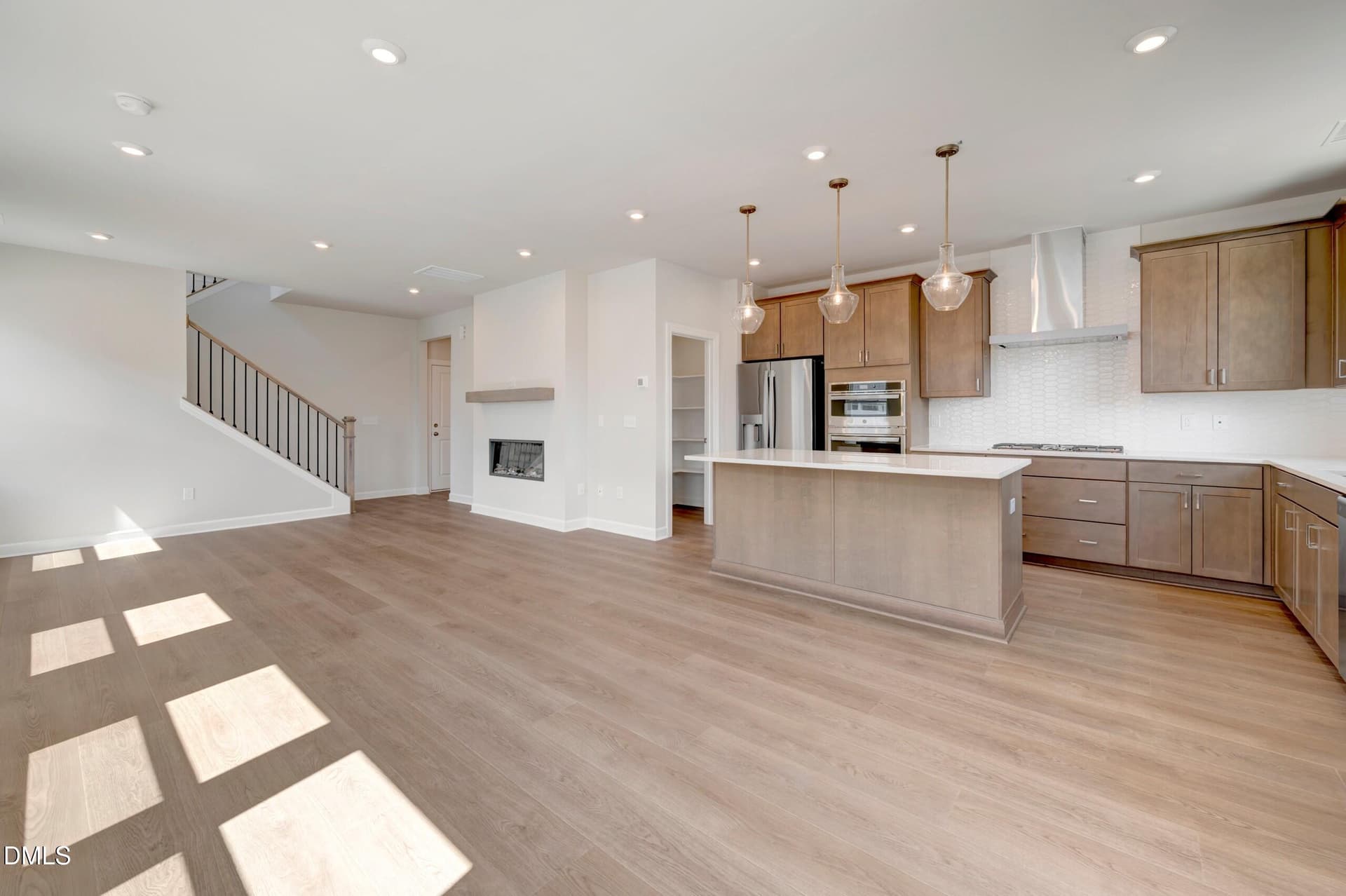 Kitchen and family room - 8 Quietwood Way, Pittsboro, NC 27312