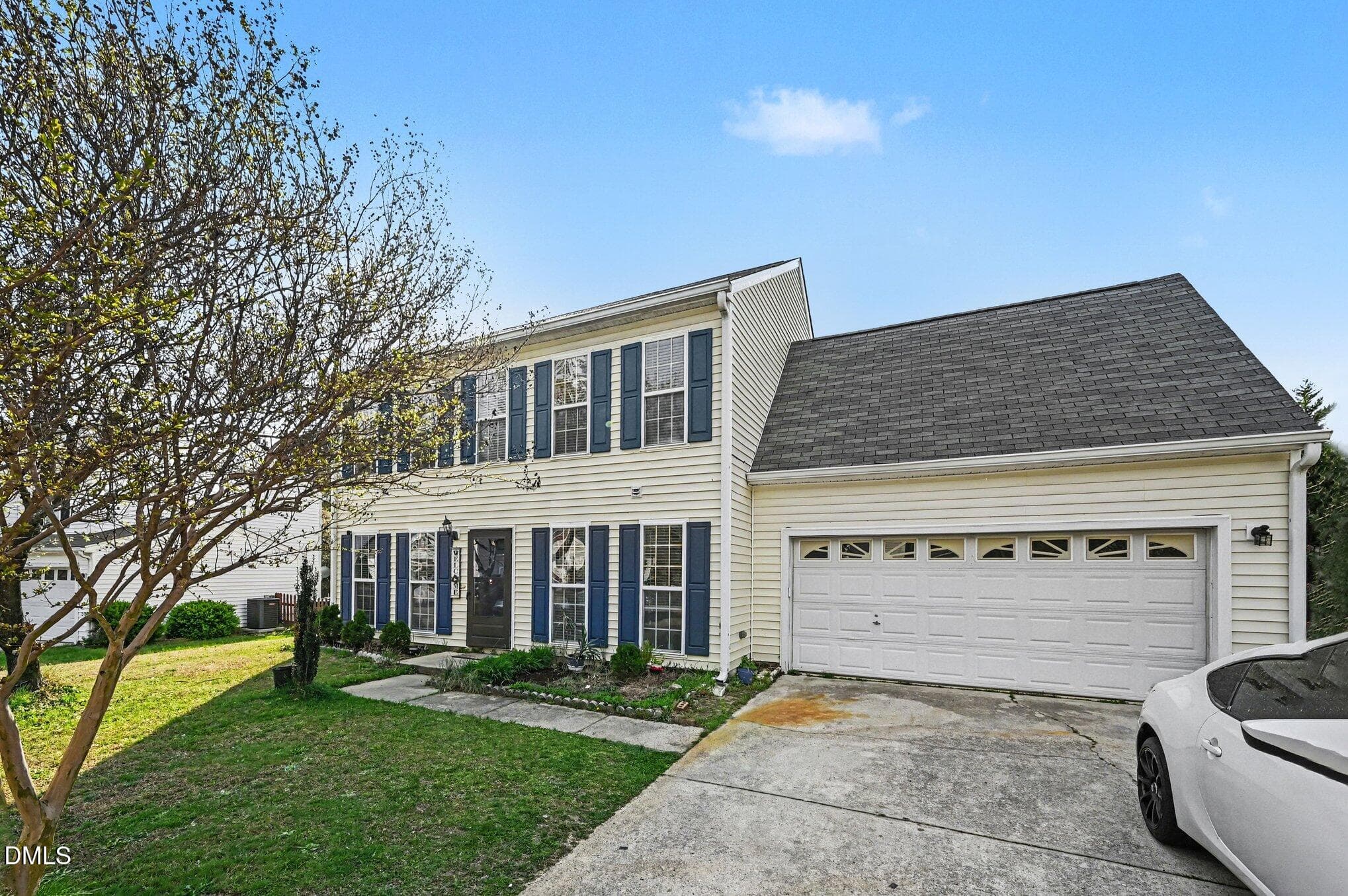Full view showing double garage - 5115 Cardinal Grove Boulevard, Raleigh, NC 27616, Raleigh