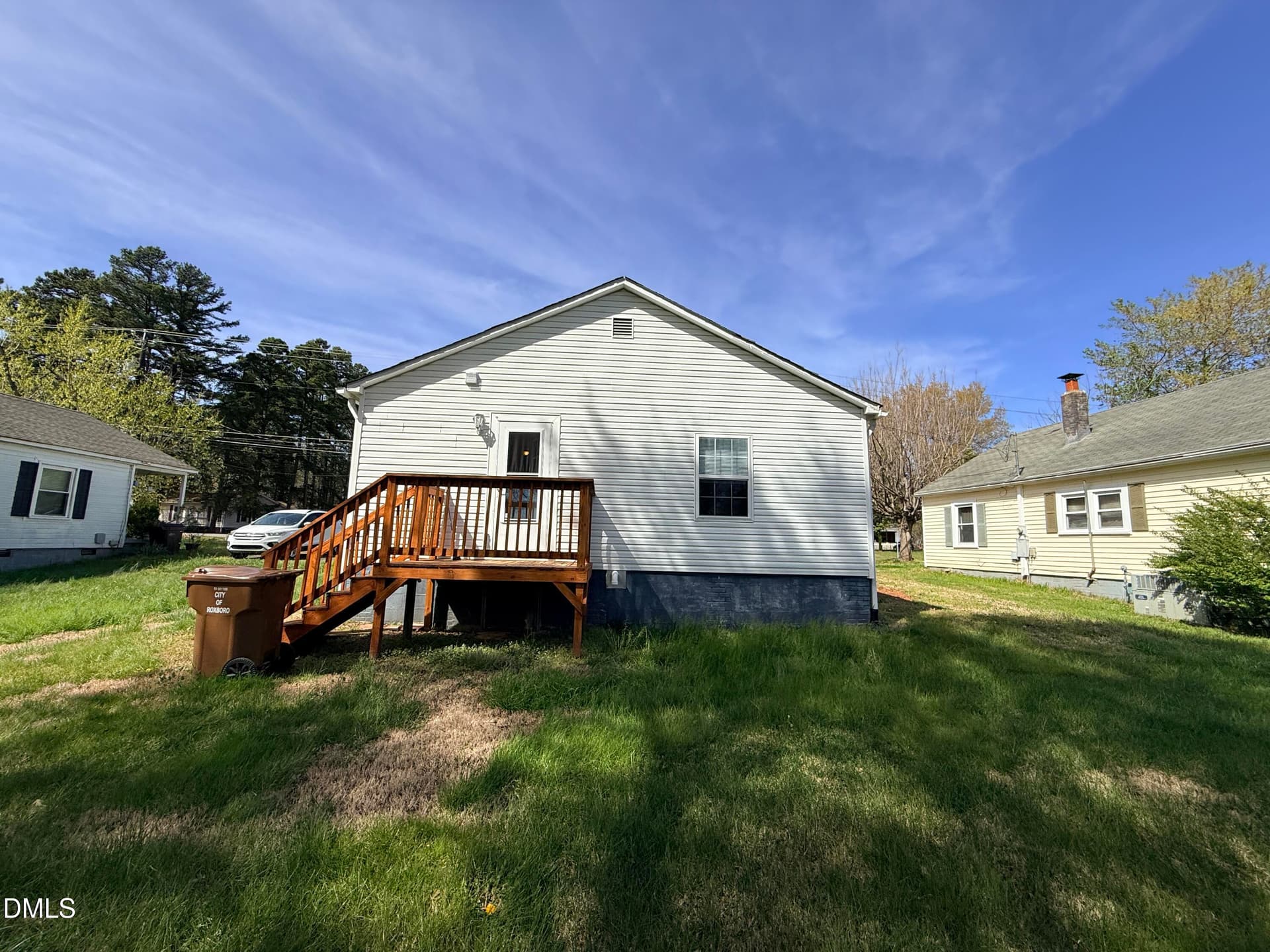 Back yard with deck - 1268 Ridge Road, Roxboro, NC 27573