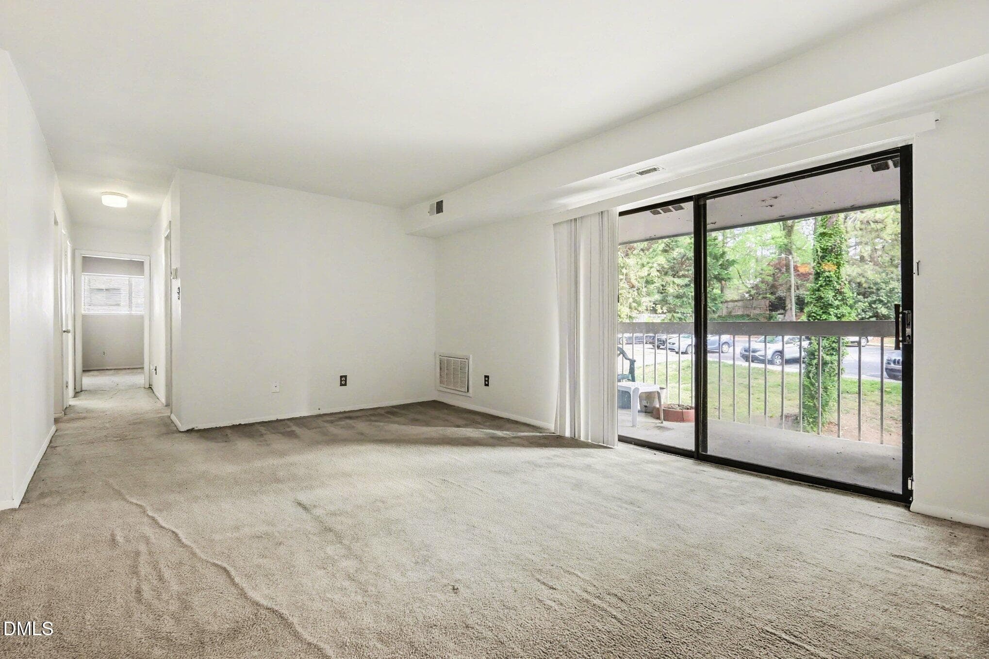 Living Room and Balcony - 1014 Sandlin Place G, Raleigh, NC 27606, Raleigh