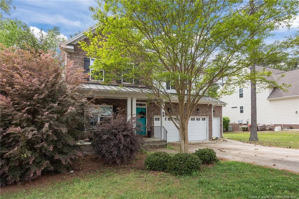 Side of home - 68 Heatherspring Way, Spring Lake, NC 28390