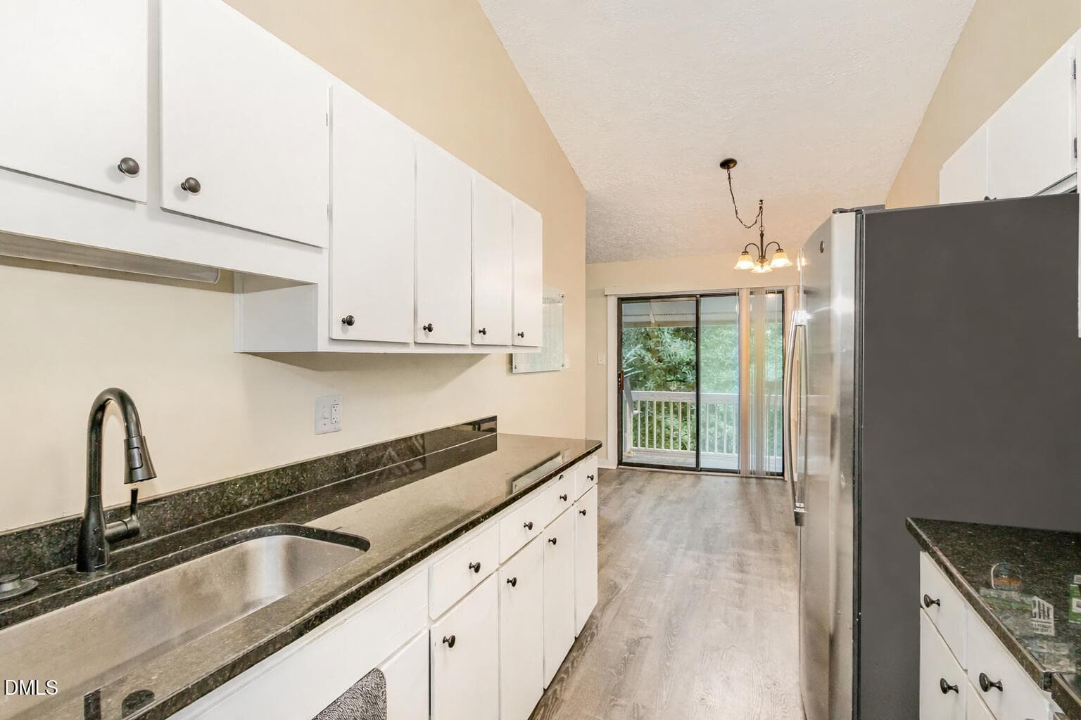 Modern kitchen with outdoor deck view - 107 Concannon Court, Cary, NC 27511, Cary