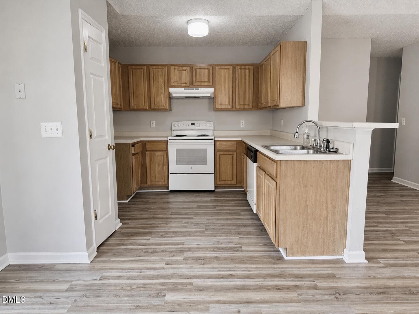 Modern kitchen with natural wood cabinet - 5212 Marthonna Way, Raleigh, NC 27616, Raleigh