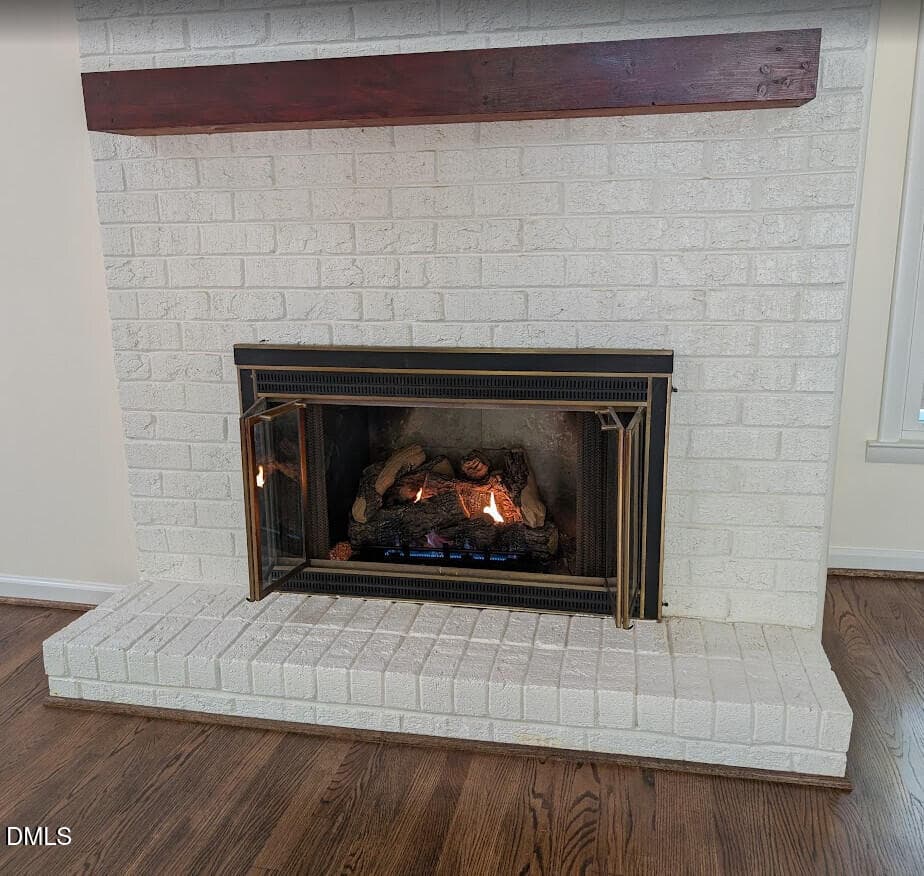 Fire in the fireplace - 702 Hillandale Lane, Garner, NC 27529