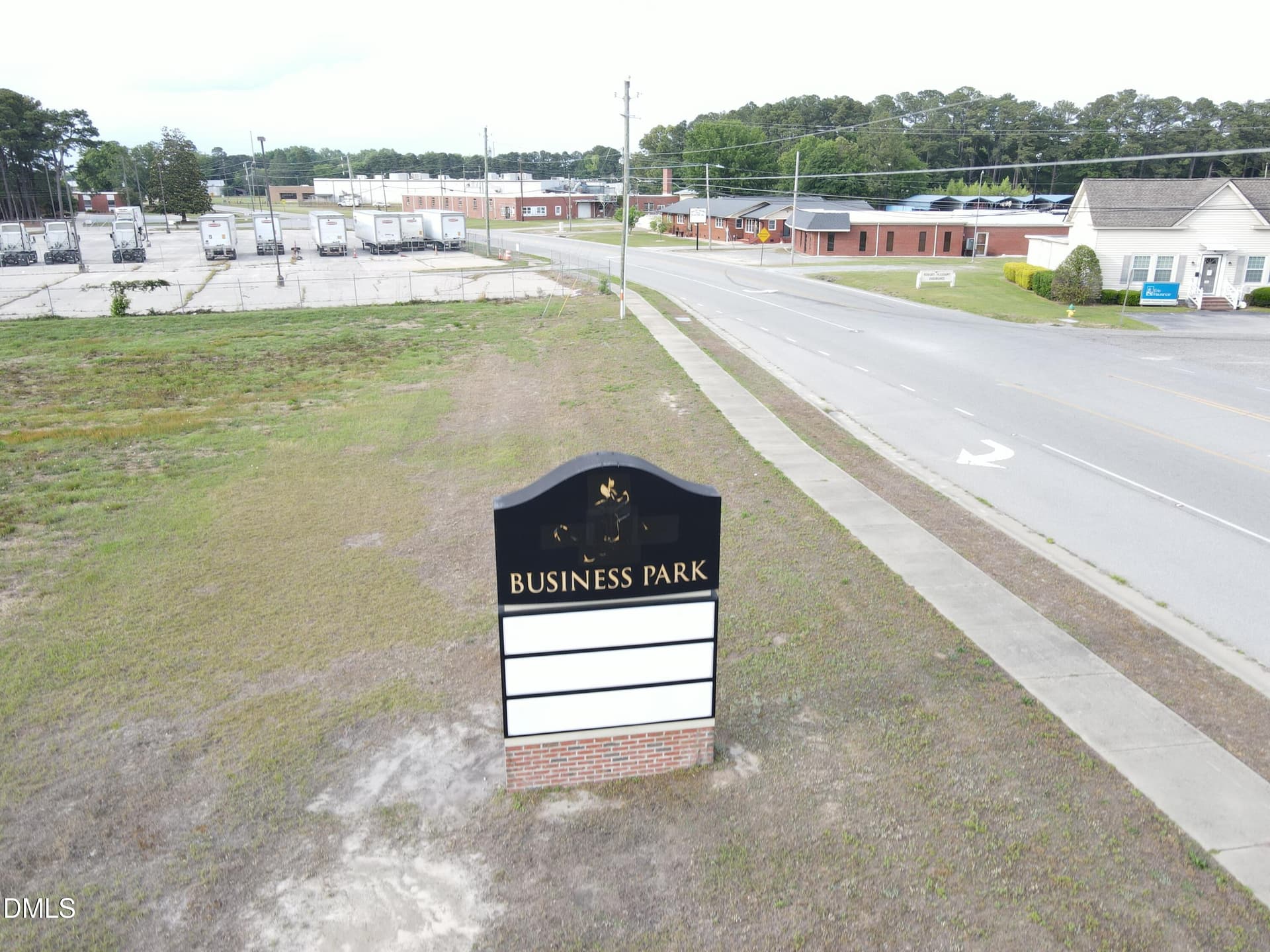 Sign on Lot 4 - 4 Four Oaks Place, Dunn, NC 28334