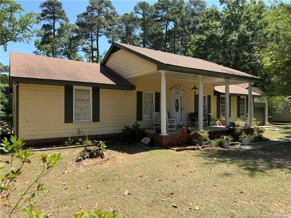 Photo 1 - 408 Old Farm Road, Raeford, NC 28376