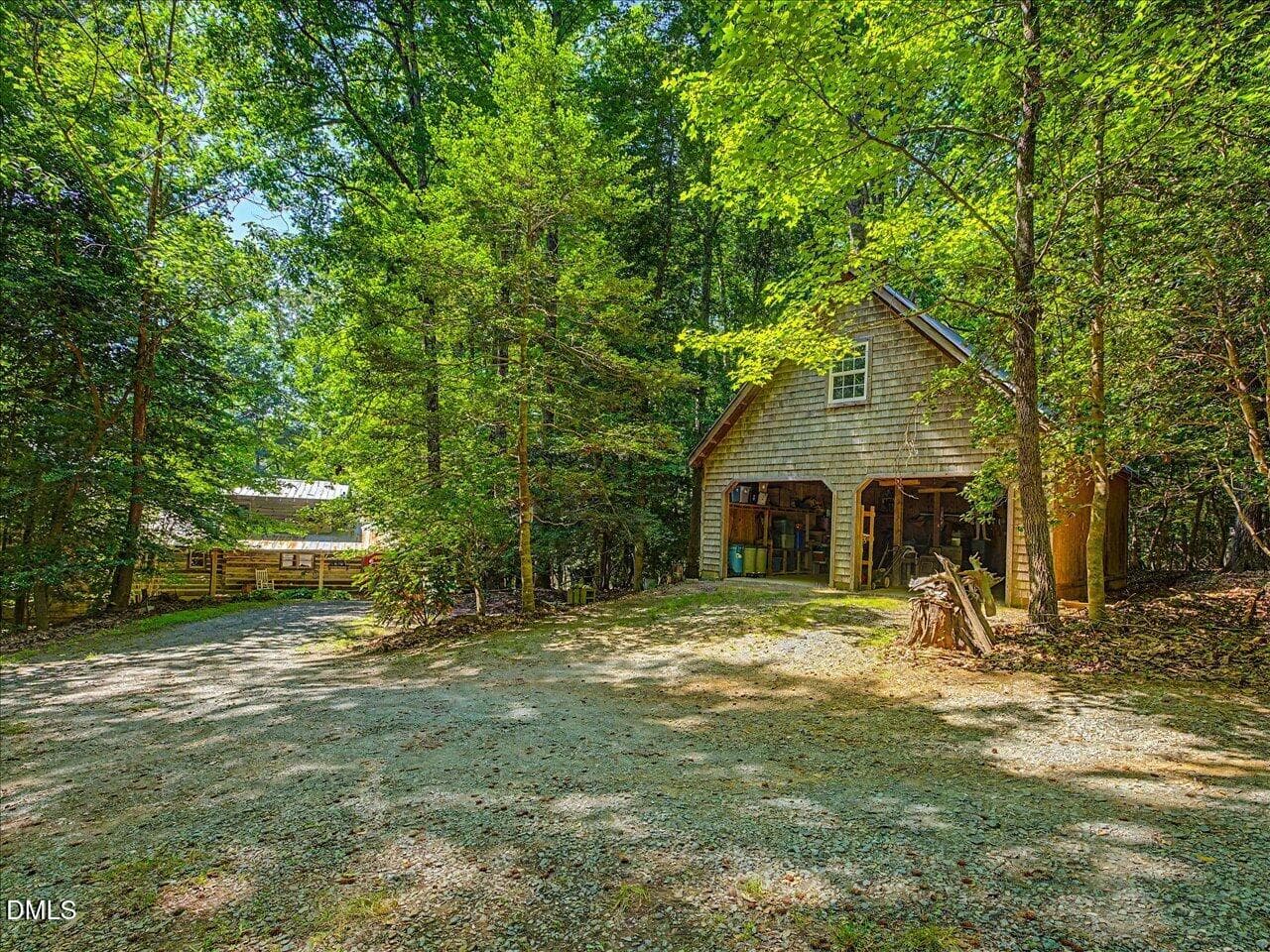 205 Anolis garage and house view - 205 Anolis Drive, Pittsboro, NC 27312
