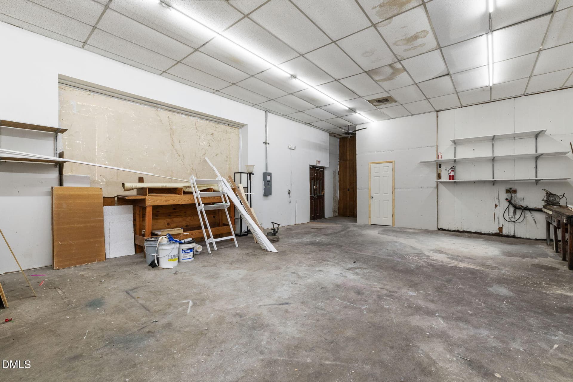 Work Room & entry to stairs - 101 S Garnett Street, Henderson, NC 27536