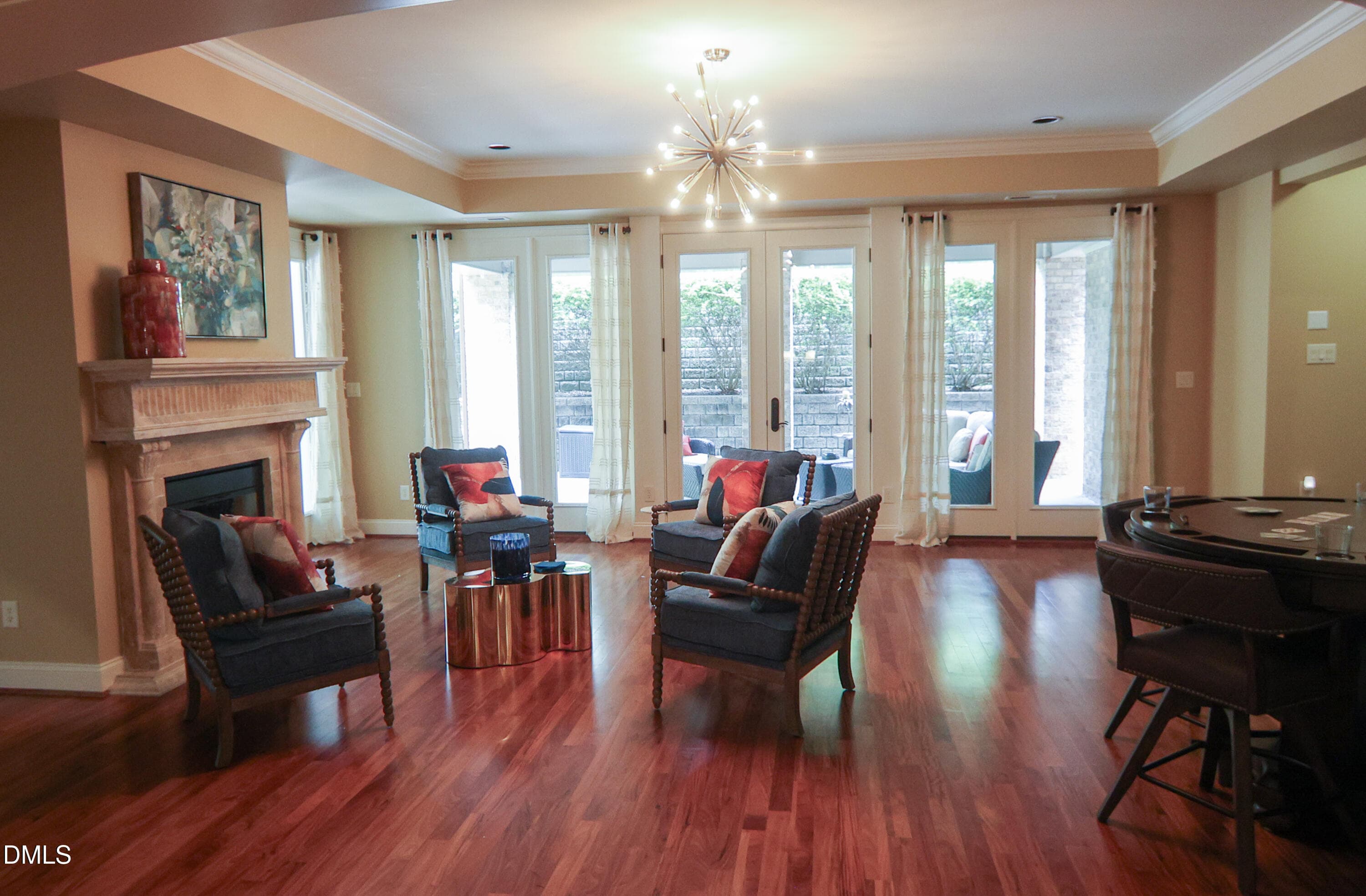 Lower-Level Living Area - View 4 - 9800 Najma Street, Raleigh, NC 27613, Raleigh