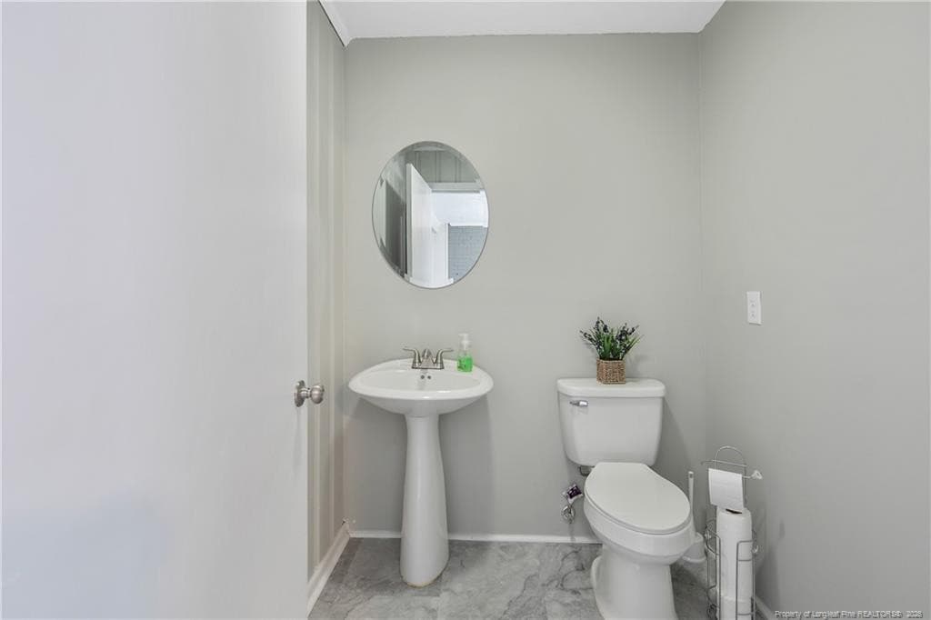 Half Bath. Convenient for guests. - 6019 S US Highway 301 Highway S, Hope Mills, NC 28348