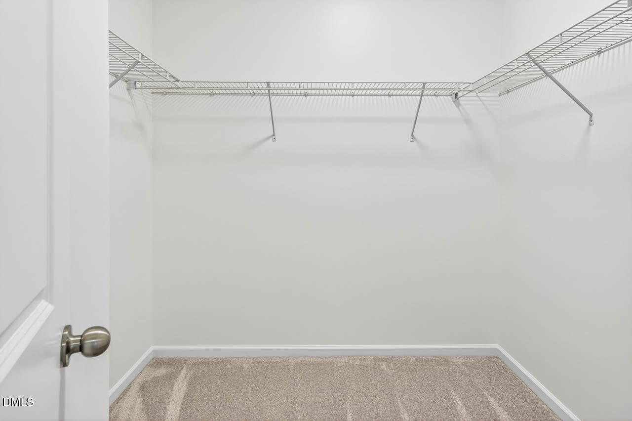 Primary Walk-In Closet - 1124 Nicklaus Drive, Durham, NC 27705, Durham