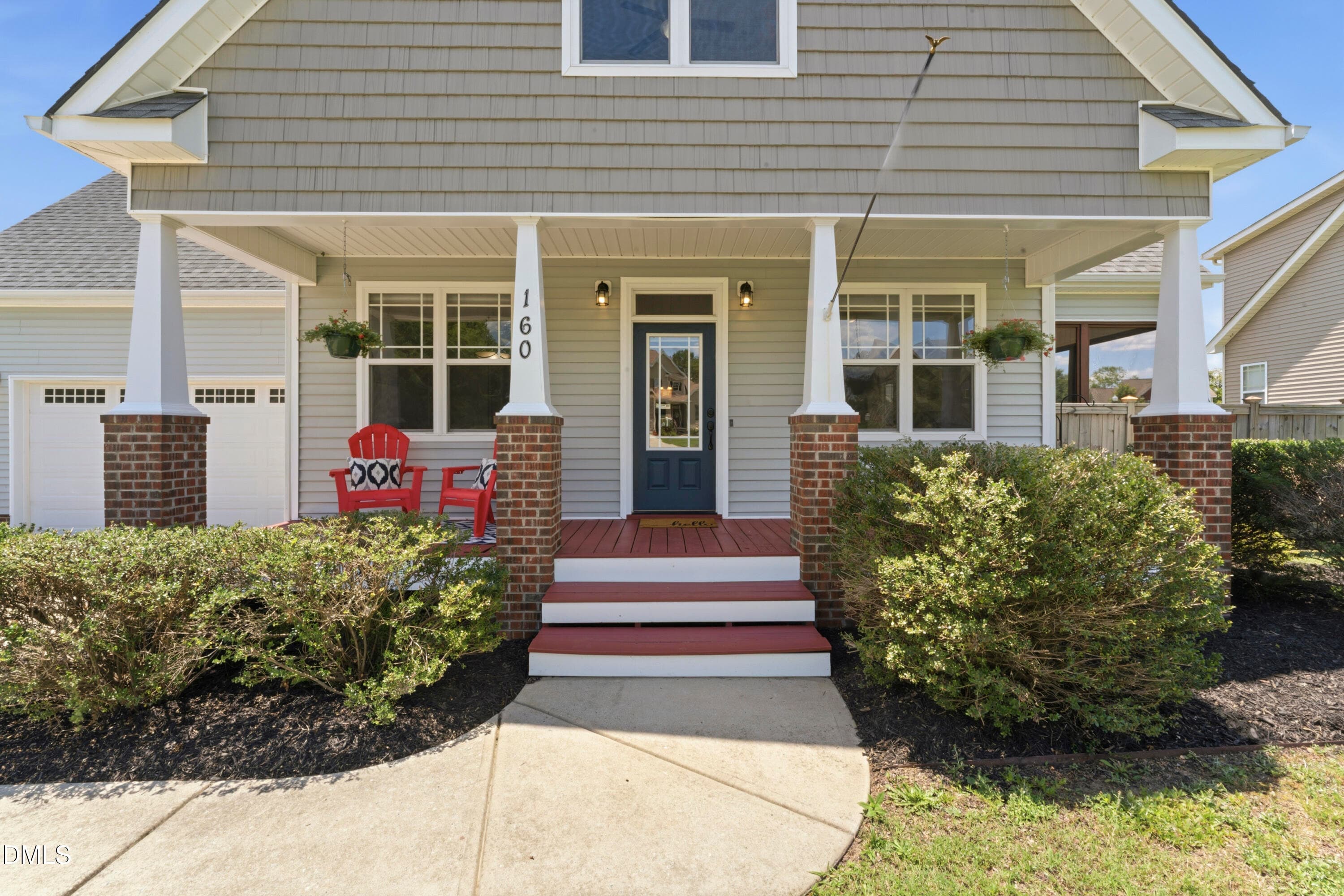 Rocking Chair Front Porch - 160 Braddock Drive, Lillington, NC 27546