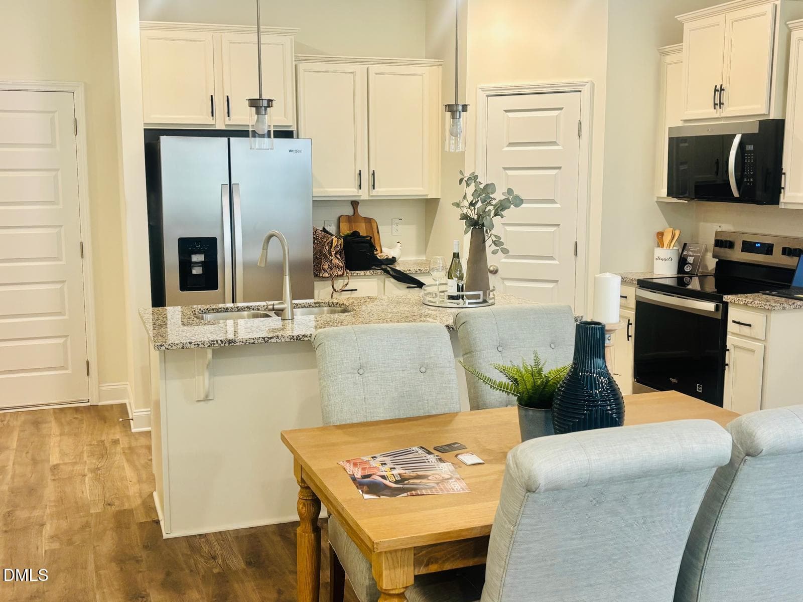 WOTH Model Staged Home Living Room to ki - 4431 Dominion Crest Drive, Apex, NC 27523