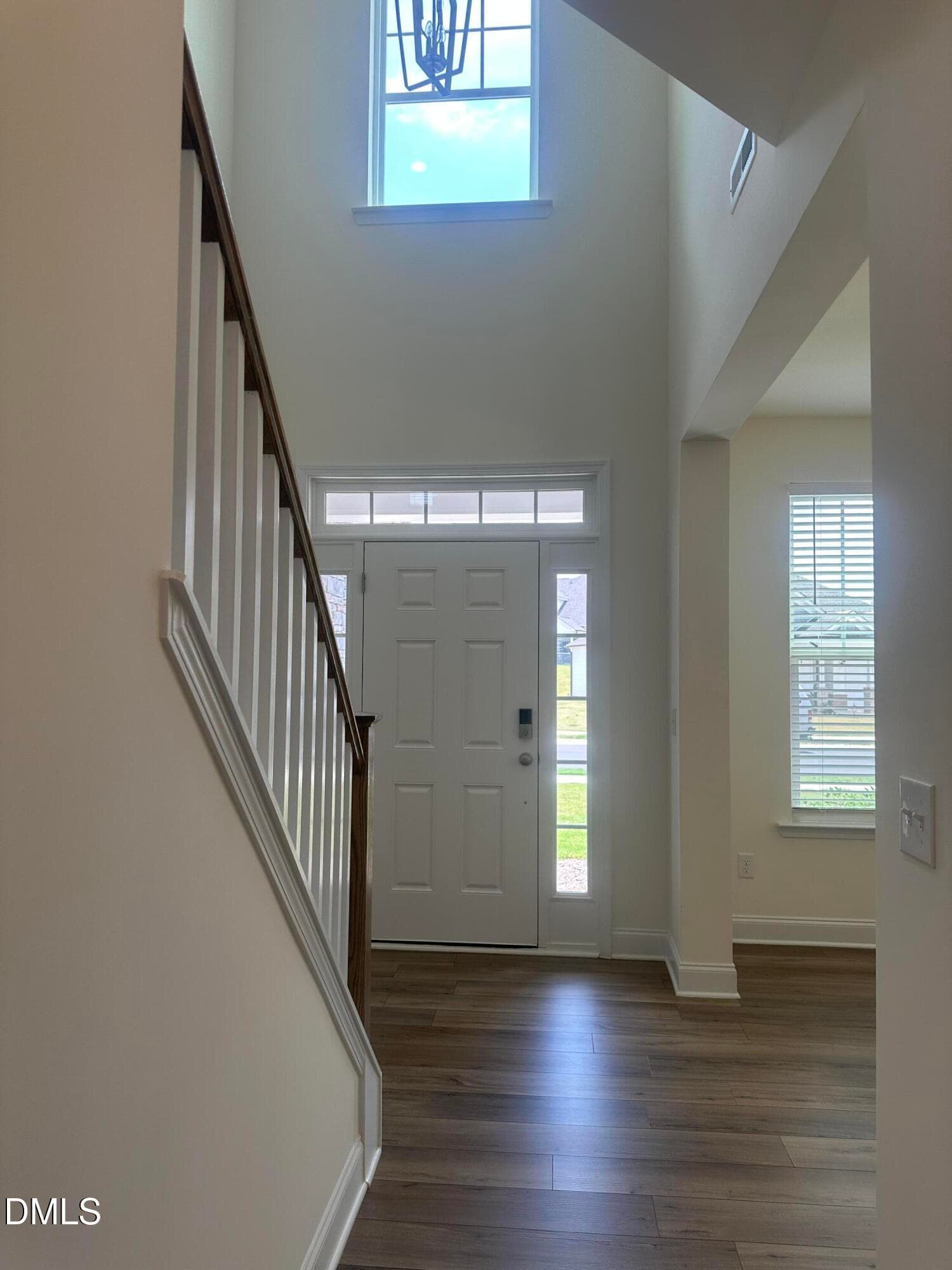 Hallway to Front door and Office or form - 1028 Channel Drop Lp, Zebulon, NC 27597