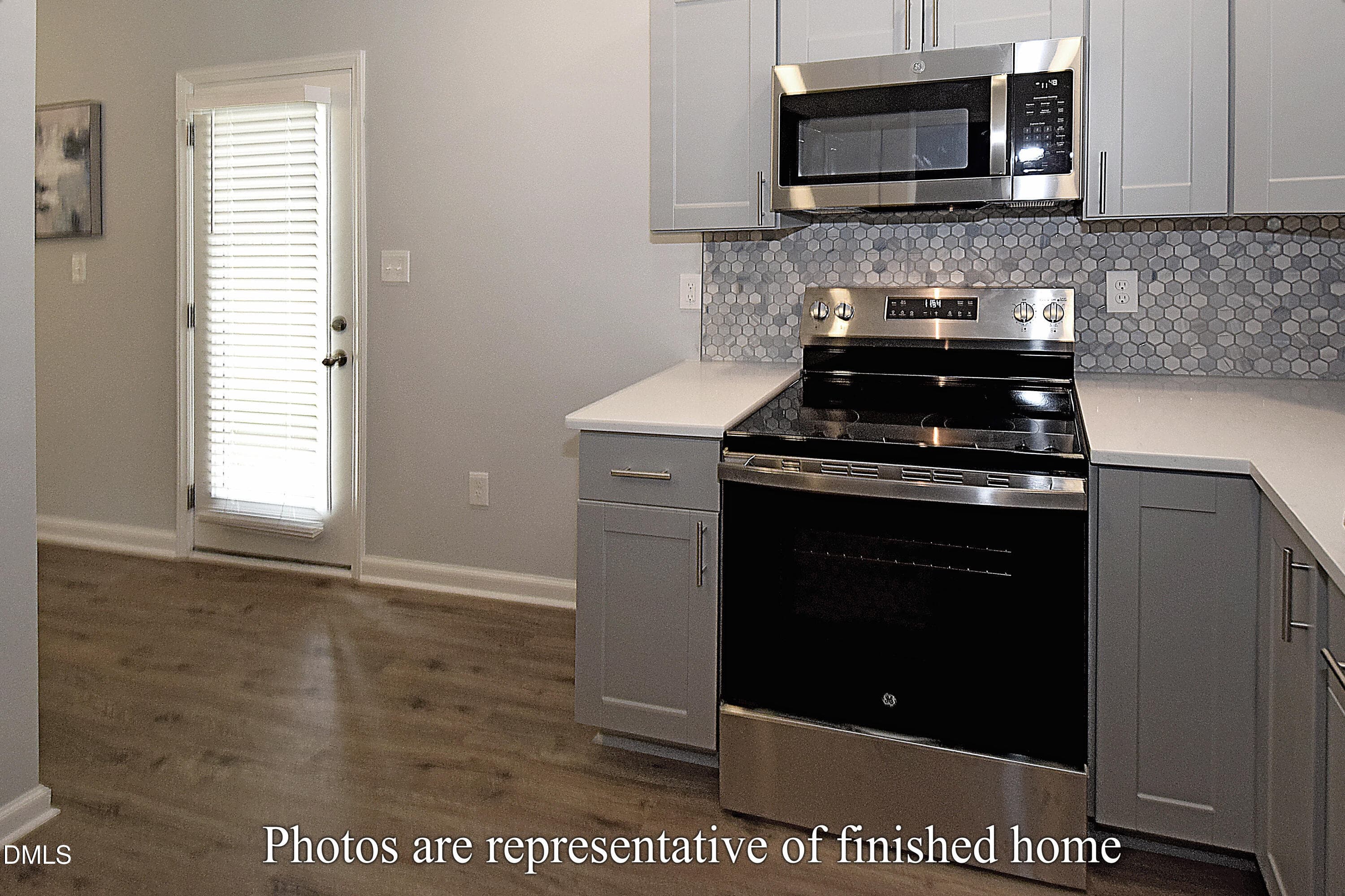 Kitchen entry and range - 3435 Littlefield Way, Greensboro, NC 27405