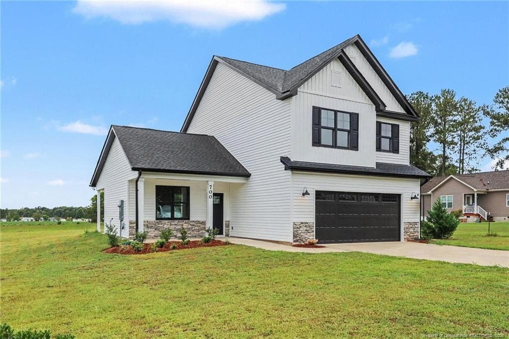 Beautiful exterior with 2 car garage - 700 Brown Road, Lillington, NC 28328