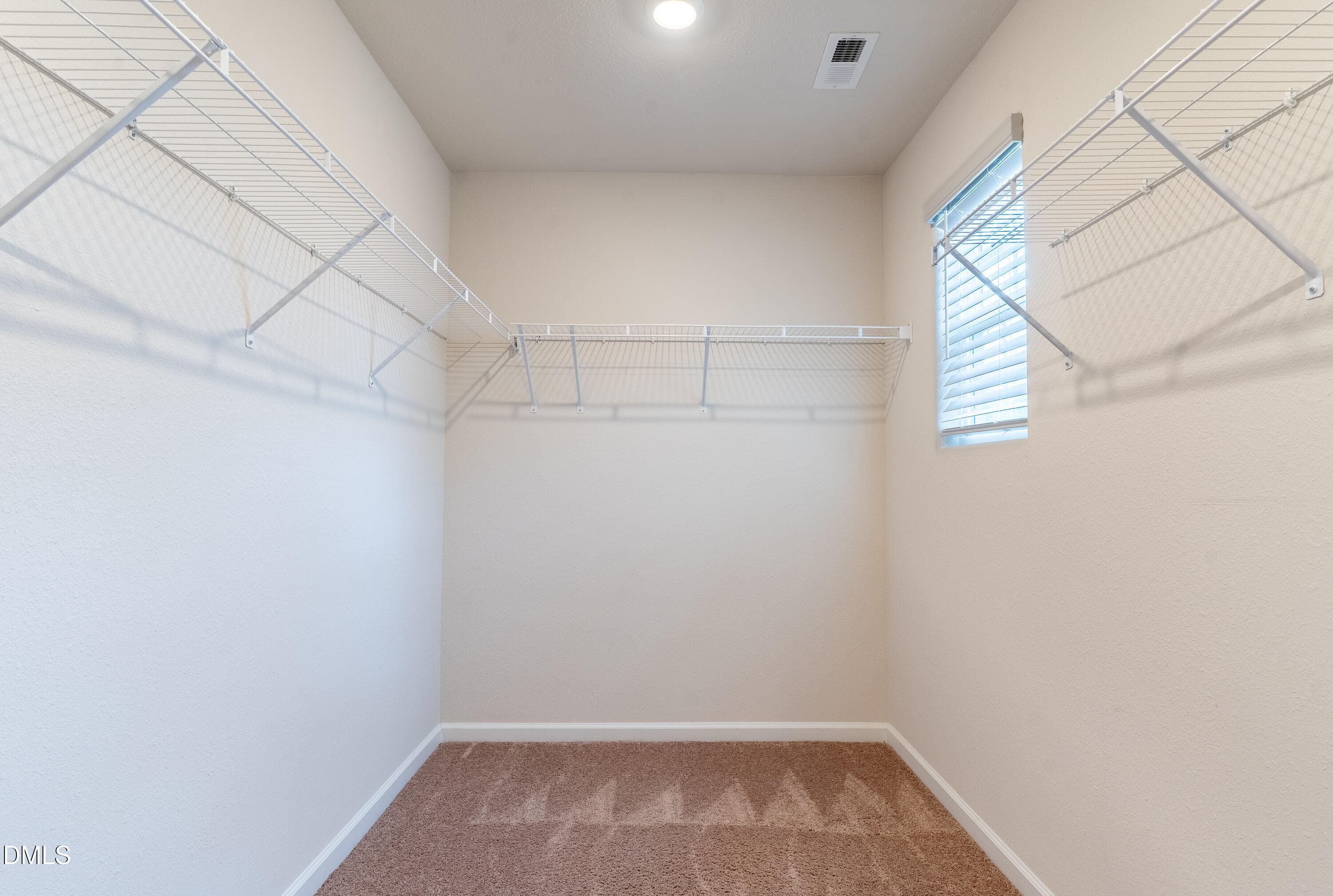 Primary Bedroom Walk-in Closet - 106 Long Green Way, Oxford, NC 27565