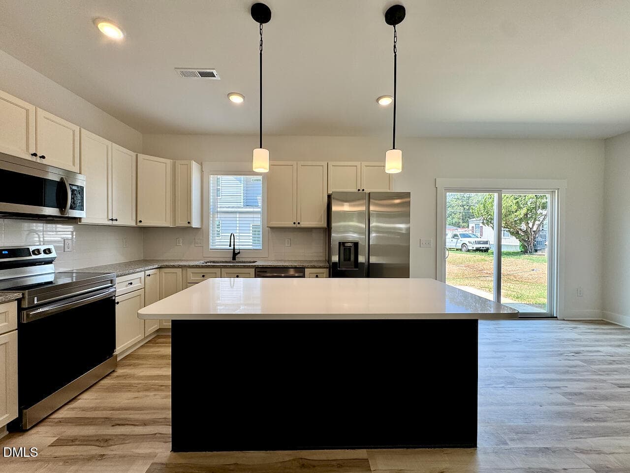 Kitchen Island + Pantry View - 218 George Street, Four Oaks, NC 27524