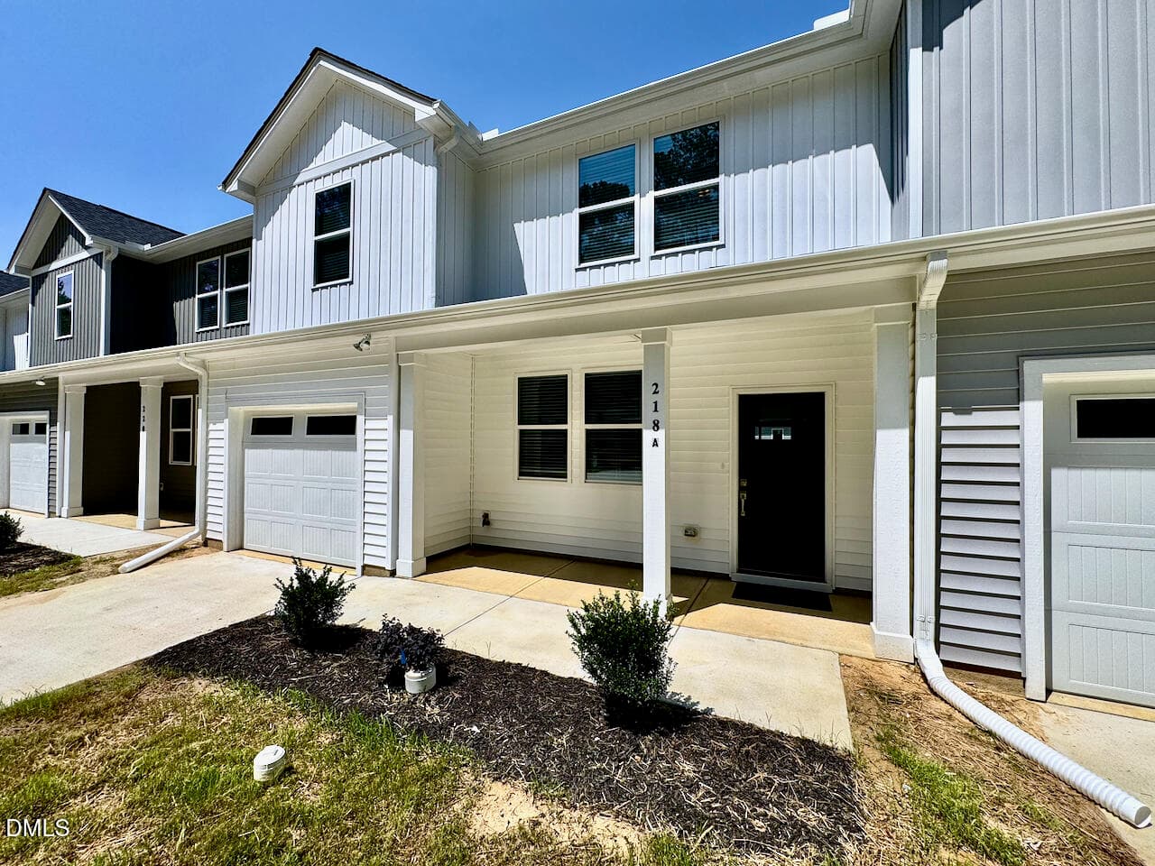 Covered Entry + Garage - 218 George Street A, Four Oaks, NC 27524