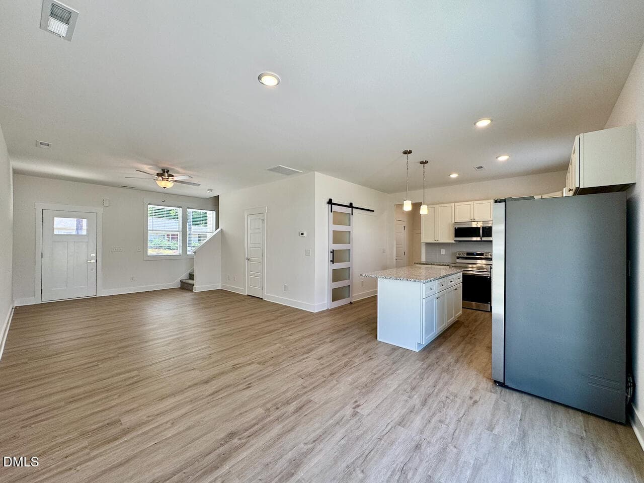 Dining + Living Room + Kitchen Flow - 218 George Street A, Four Oaks, NC 27524