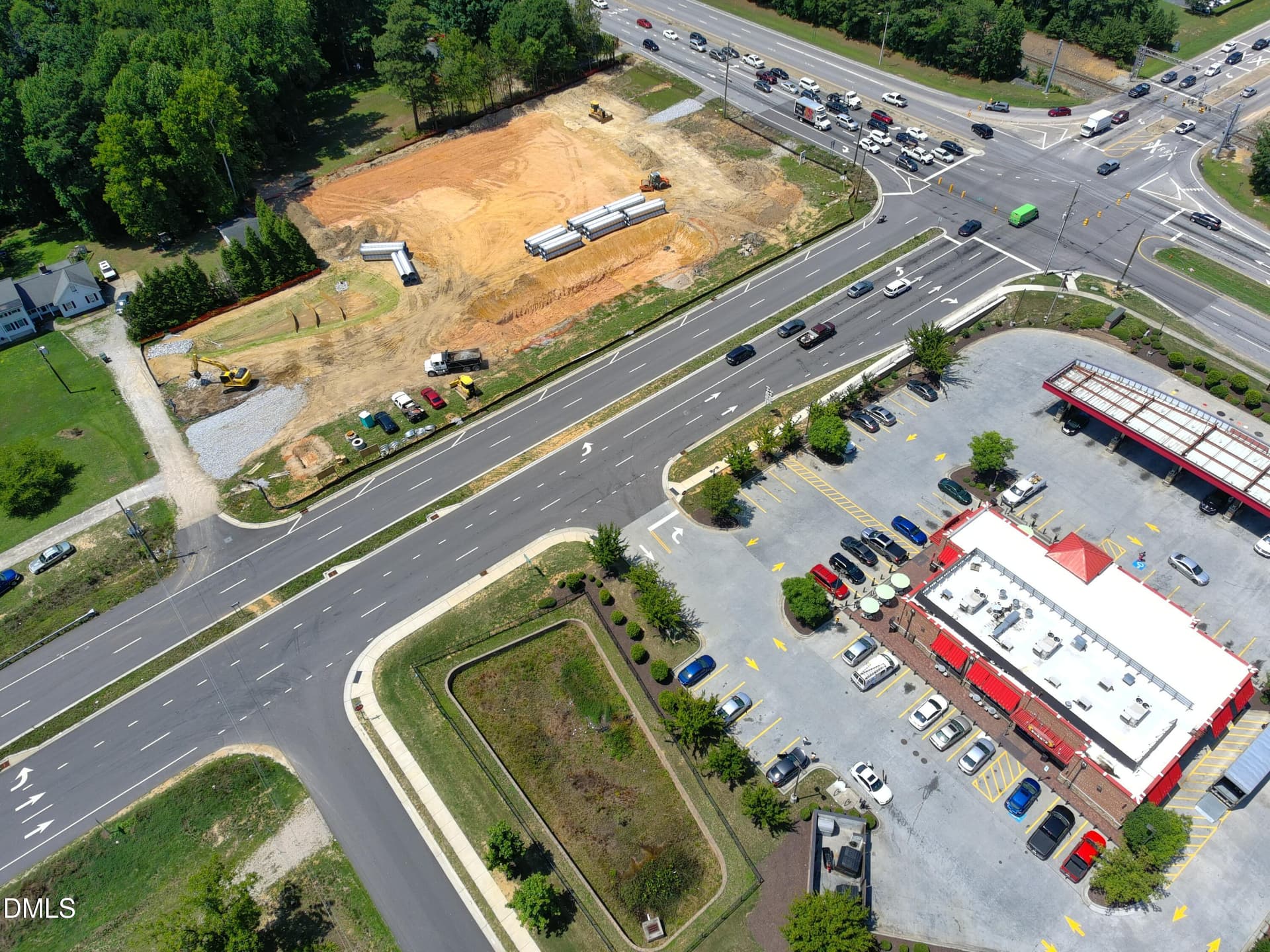 VIEW OF LOT BEHIND ALDI BEING BUILT - 1229 Tulip Street, Clayton, NC 27520