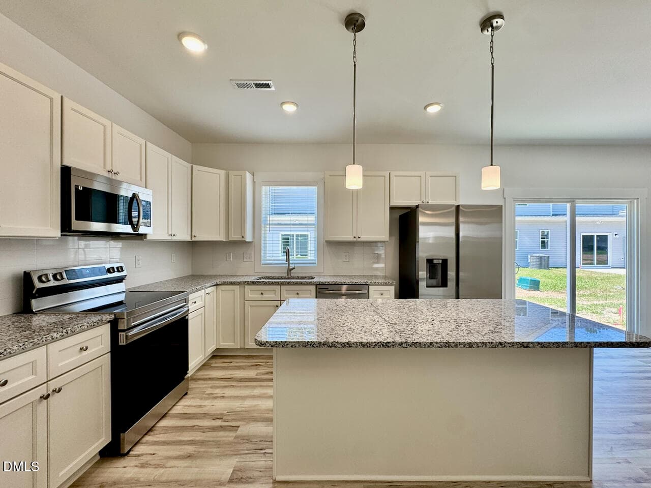 Kitchen Straight-On Island View - 220 George Street, Four Oaks, NC 27524