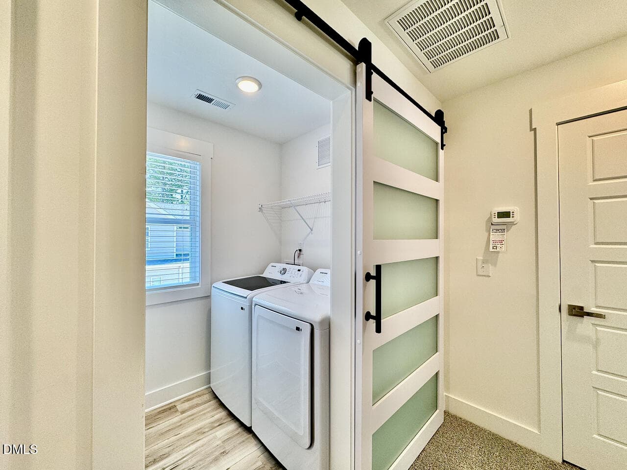 Upstairs Laundry with Glass Barn Door - 220 George Street, Four Oaks, NC 27524