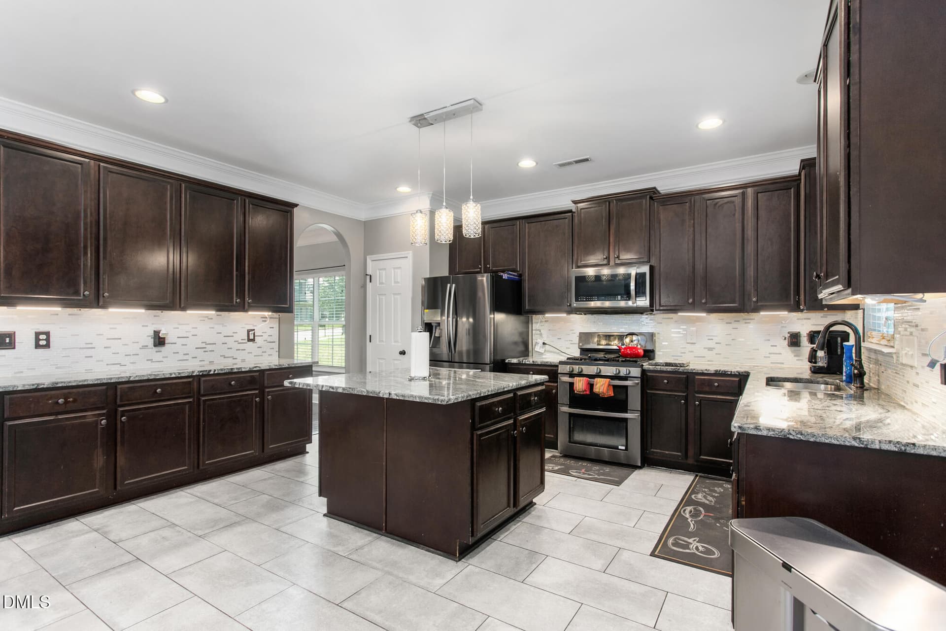 Kitchen w/SS appliances - 2026 Heron Pointe Drive, Whitsett, NC 27377