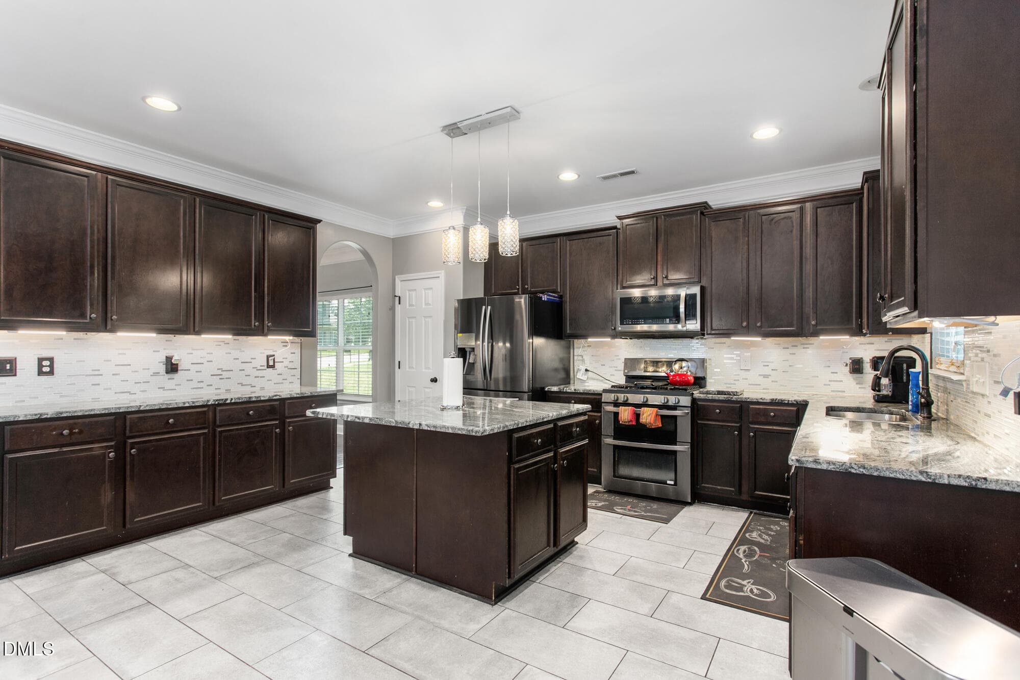 Kitchen w/SS appliances - 2026 Heron Pointe Drive, Whitsett, NC 27377