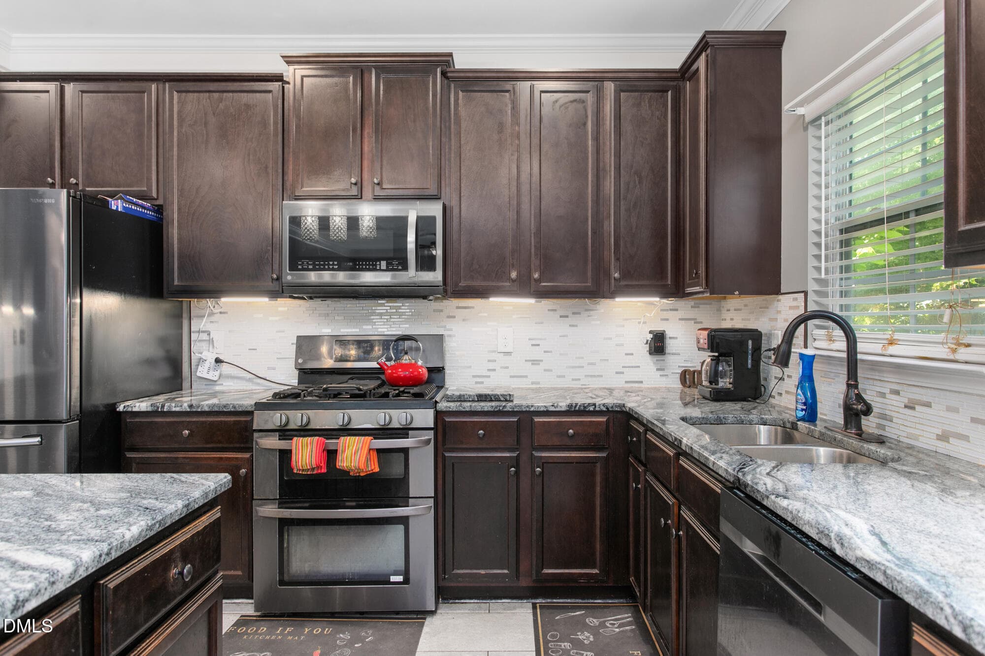 Kitchen w/gas range - 2026 Heron Pointe Drive, Whitsett, NC 27377