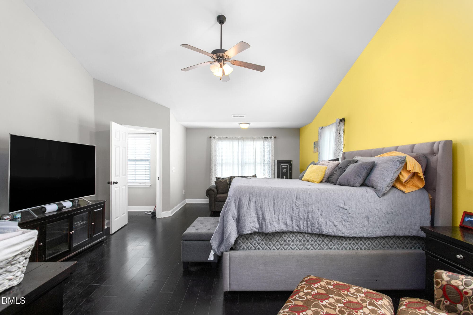 Primary bedroom w/sitting area - 2026 Heron Pointe Drive, Whitsett, NC 27377