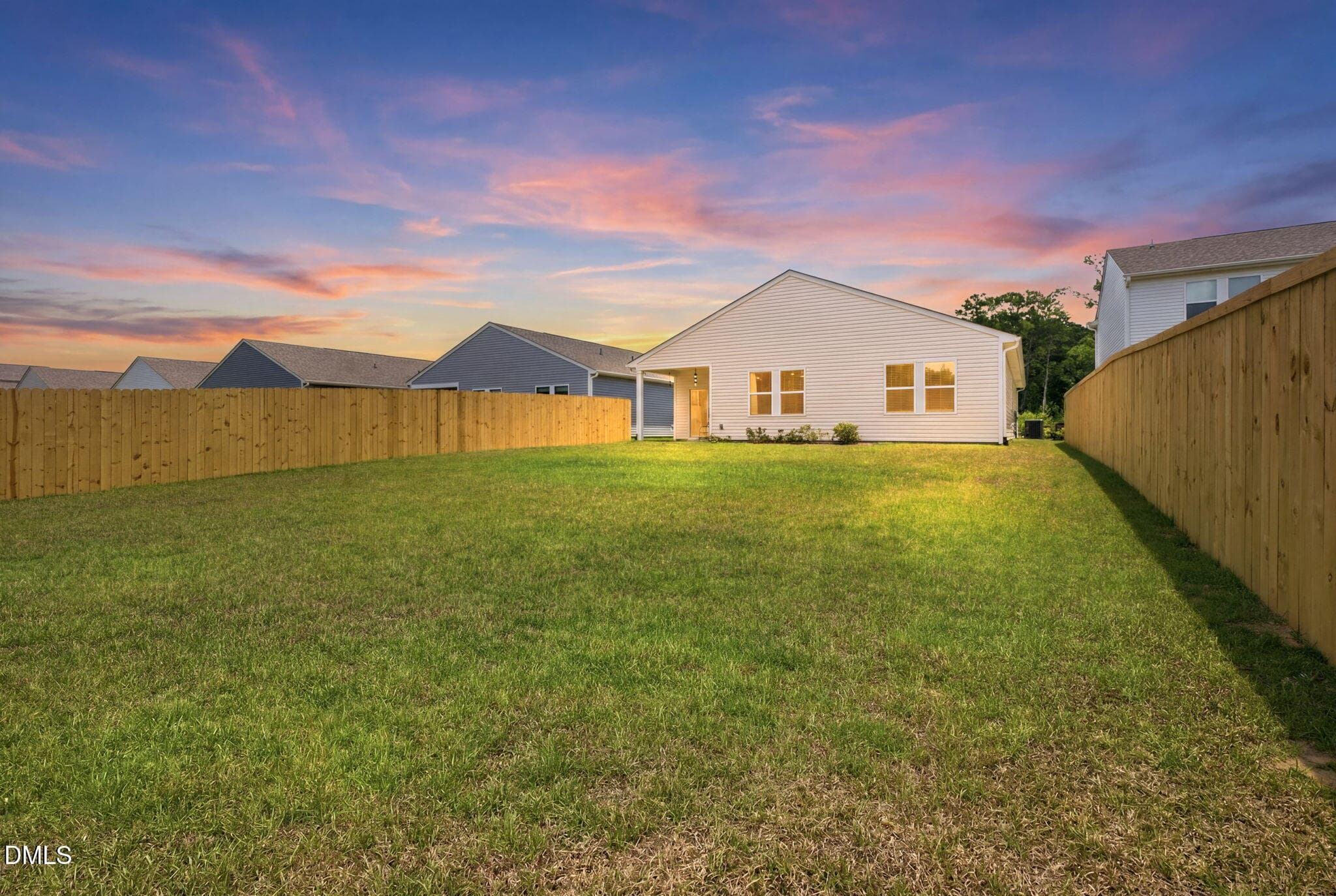 twilight-rear exterior-4 - 249 Ocean Pointe Boulevard SE, Bolivia, NC 28422