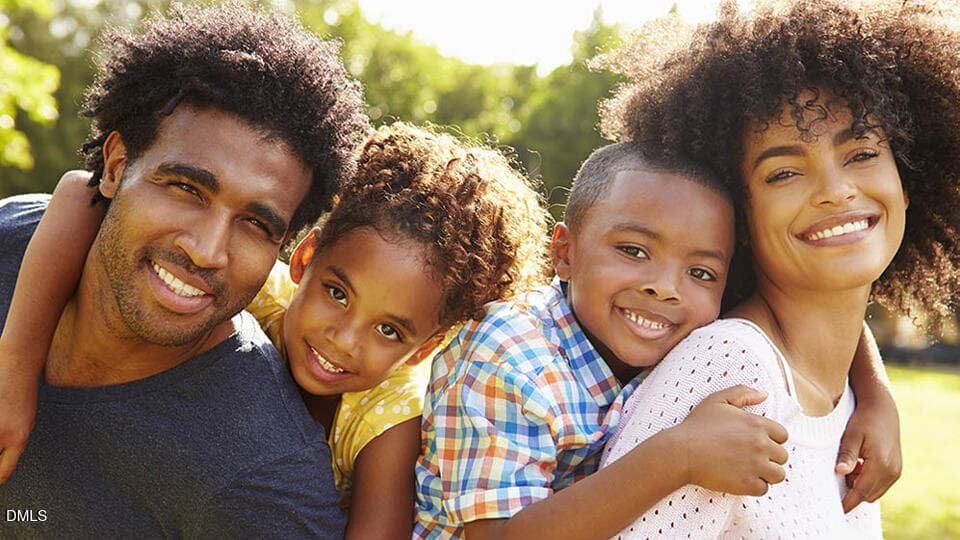 Young-African-American-Family-Smiling-Pi - 11 Cheyenne Drive, Clayton, NC 27520