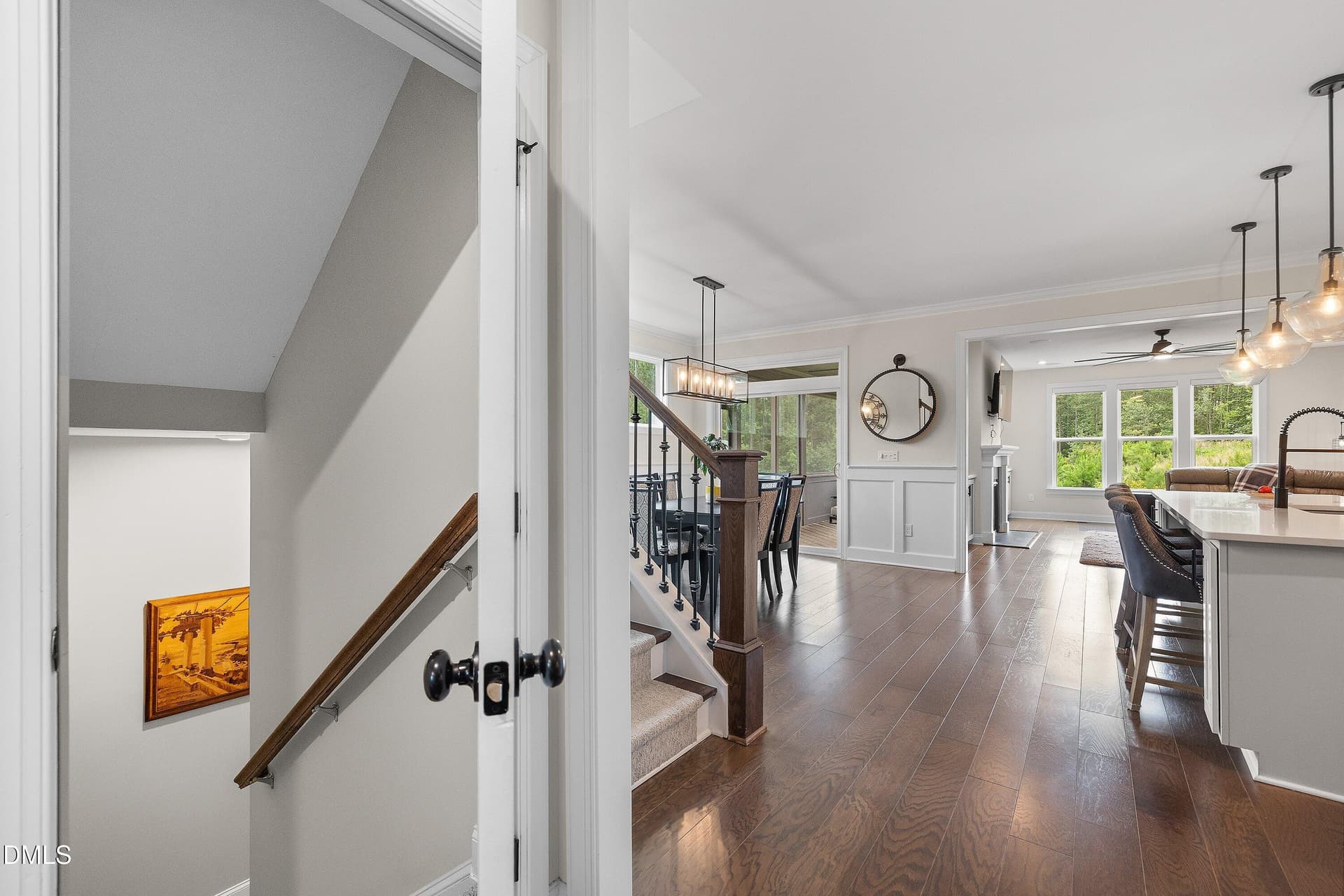 Staircase to lower level and upper level - 1317 Magnolia Gln Circle, Wake Forest, NC 27587