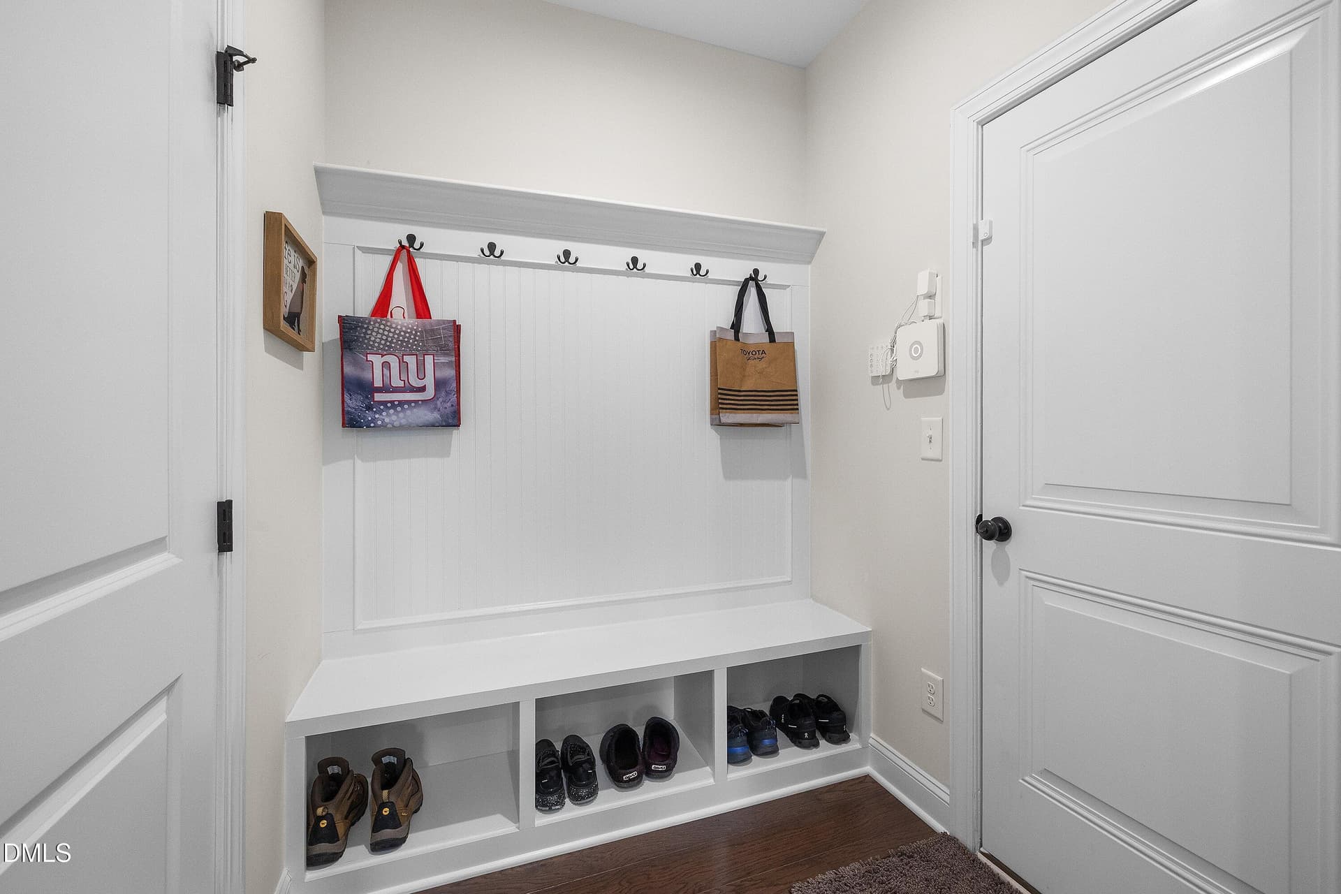 Mudroom with bench and shelf/hooks - 1317 Magnolia Gln Circle, Wake Forest, NC 27587