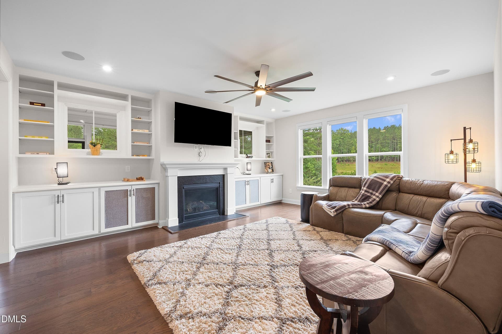 Living room with builtins - 1317 Magnolia Gln Circle, Wake Forest, NC 27587