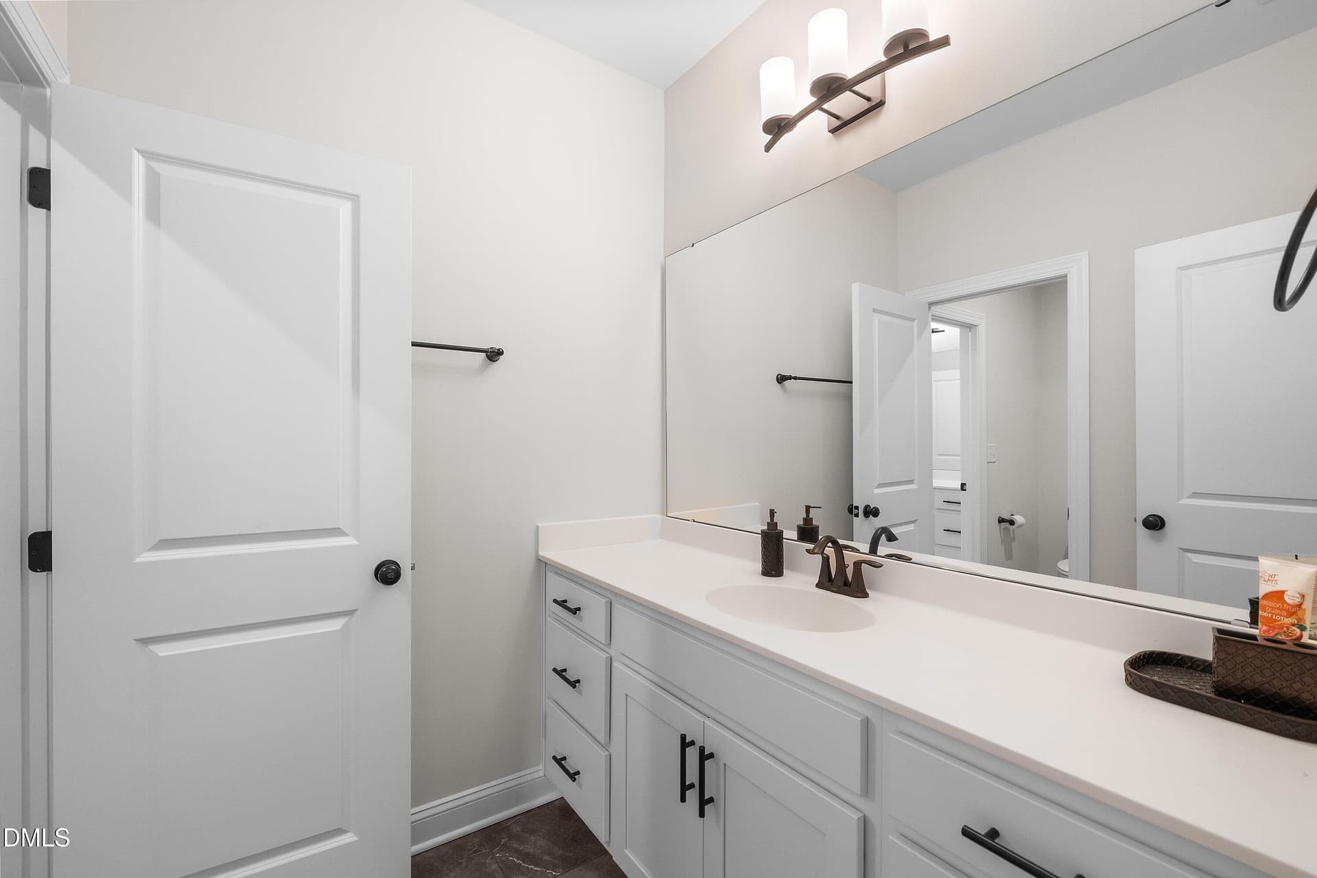 Jack N Jill bathroom - 1317 Magnolia Gln Circle, Wake Forest, NC 27587