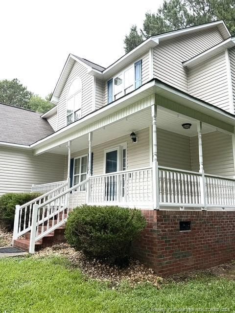 Partial wrap around porch - 92 Dove Pointe Lane, Clayton, NC 27520