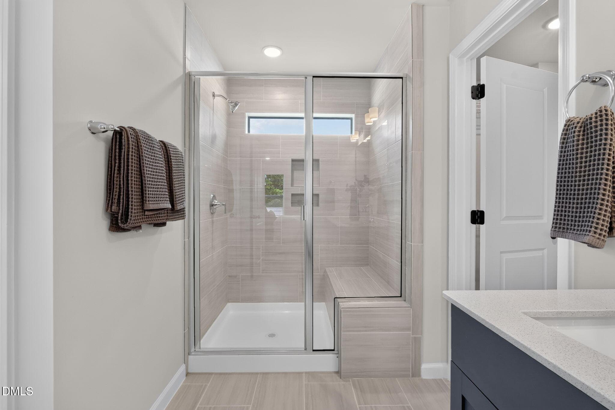Wide Tiled Shower with Bench - 552 Beacon Hill Road, Lillington, NC 27546