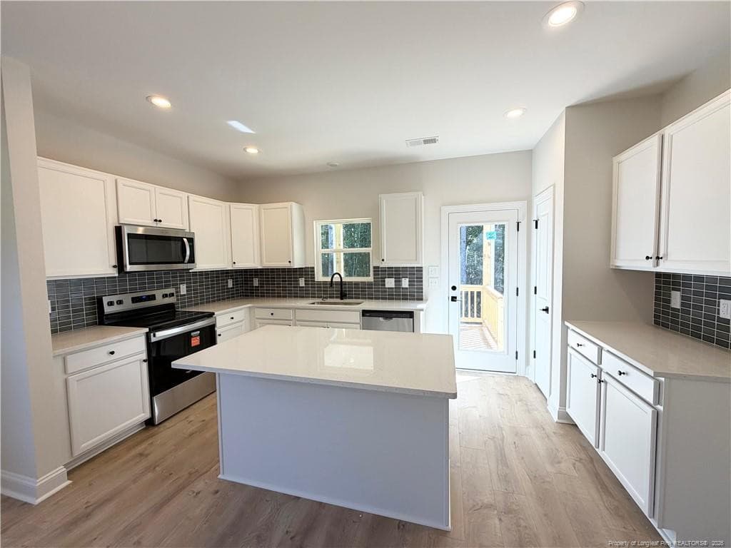 Photo 6 - 575 Grand Griffon Way, Lillington, NC 27546