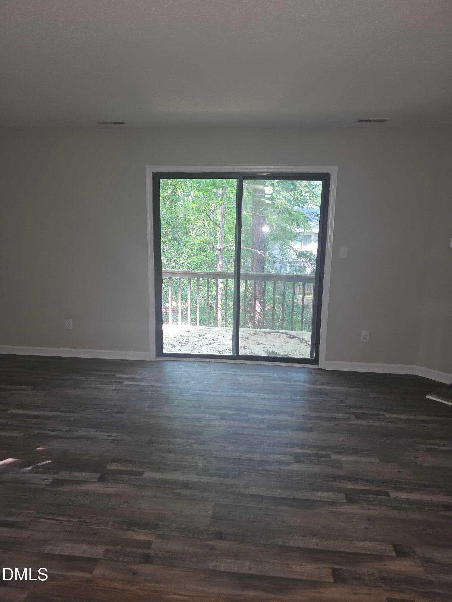Door to deck in Family Room - 7389 Sandy Creek Drive, Raleigh, NC 27615, Raleigh