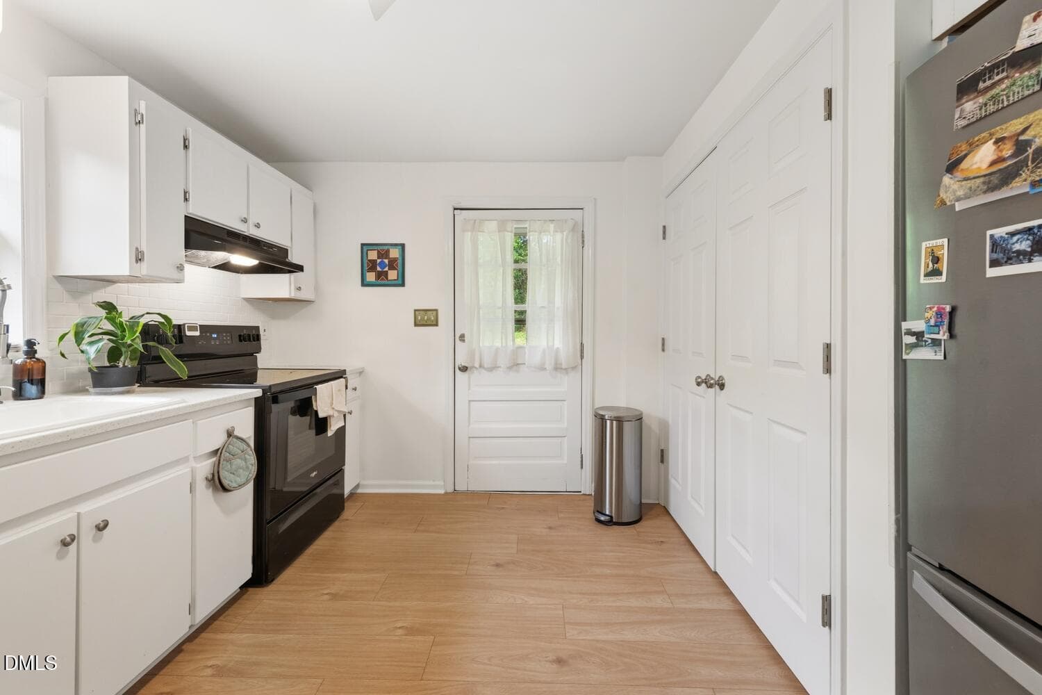 Kitchen laundry closet - 1207 Berkeley Street, Durham, NC 27705, Durham
