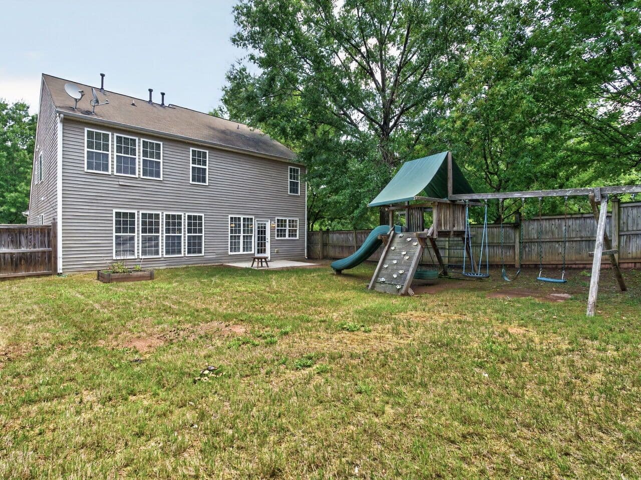 033-1280x960-back-of-home.jpg - 7803 Clover Creek Court, Raleigh, NC 27613, Raleigh