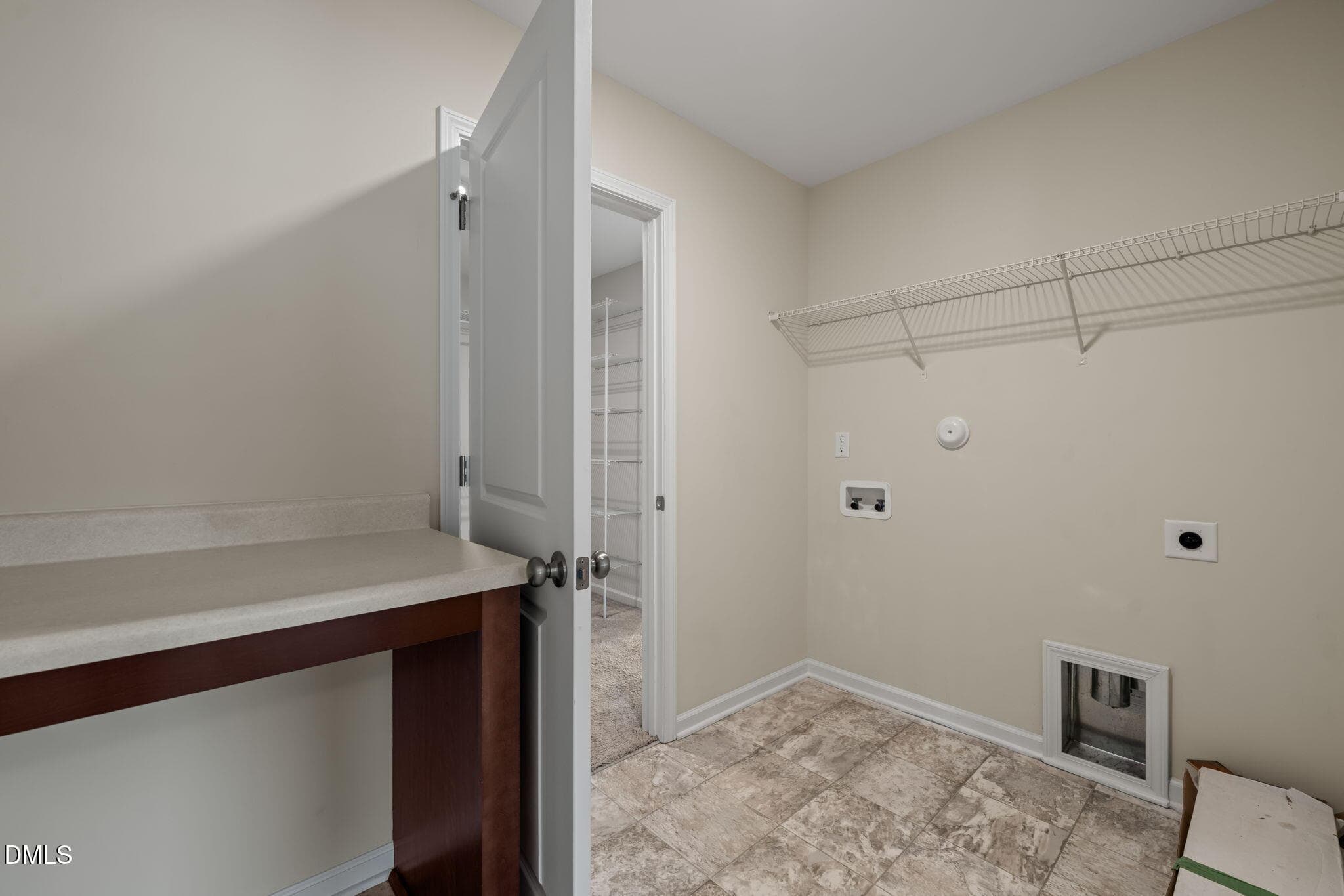 Laundry w/ loft and primary suite access - 107 White Burley Court, Durham, NC 27703, Durham