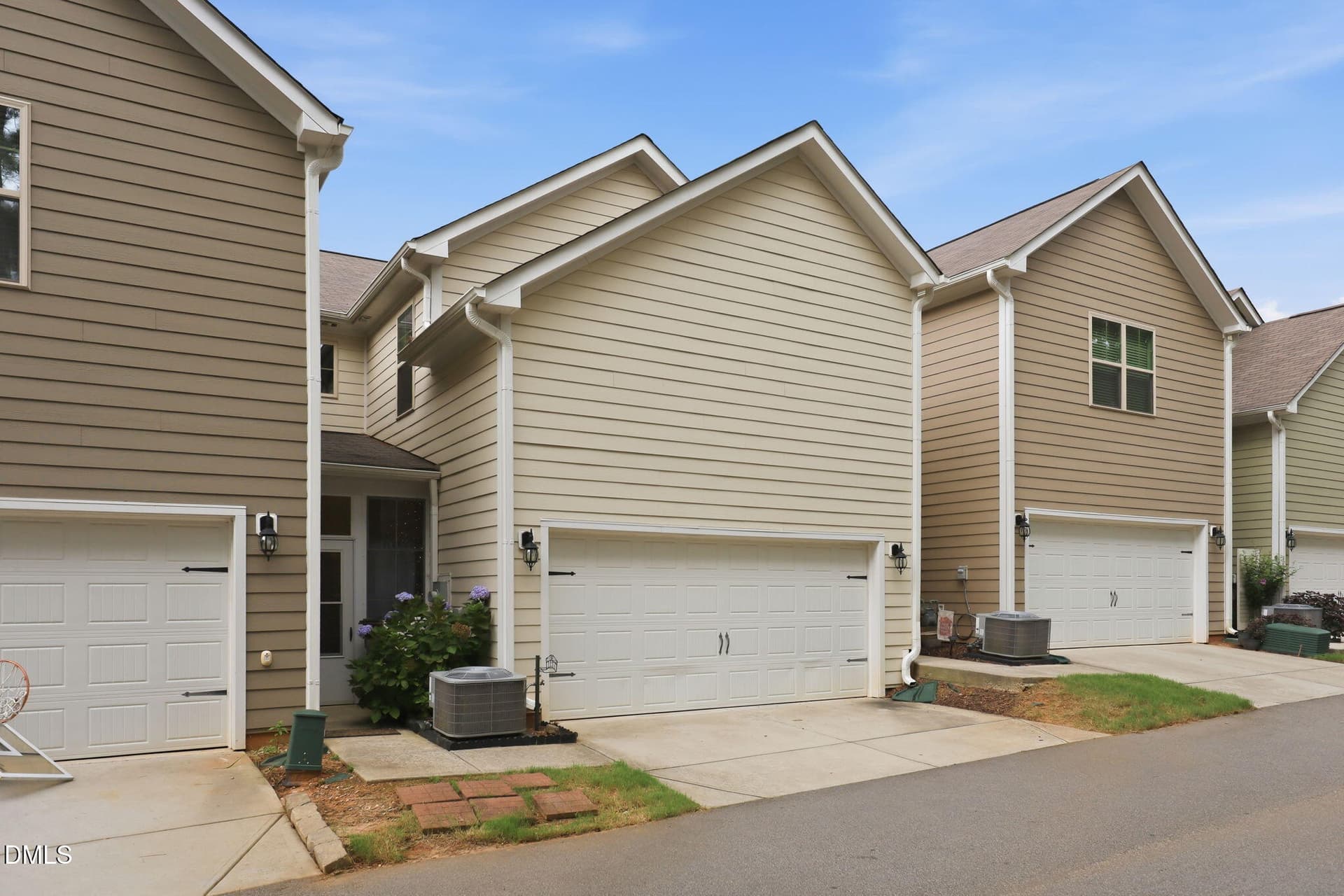 back entrance/garage - 1177 Treetop Meadow Lane, Wake Forest, NC 27587