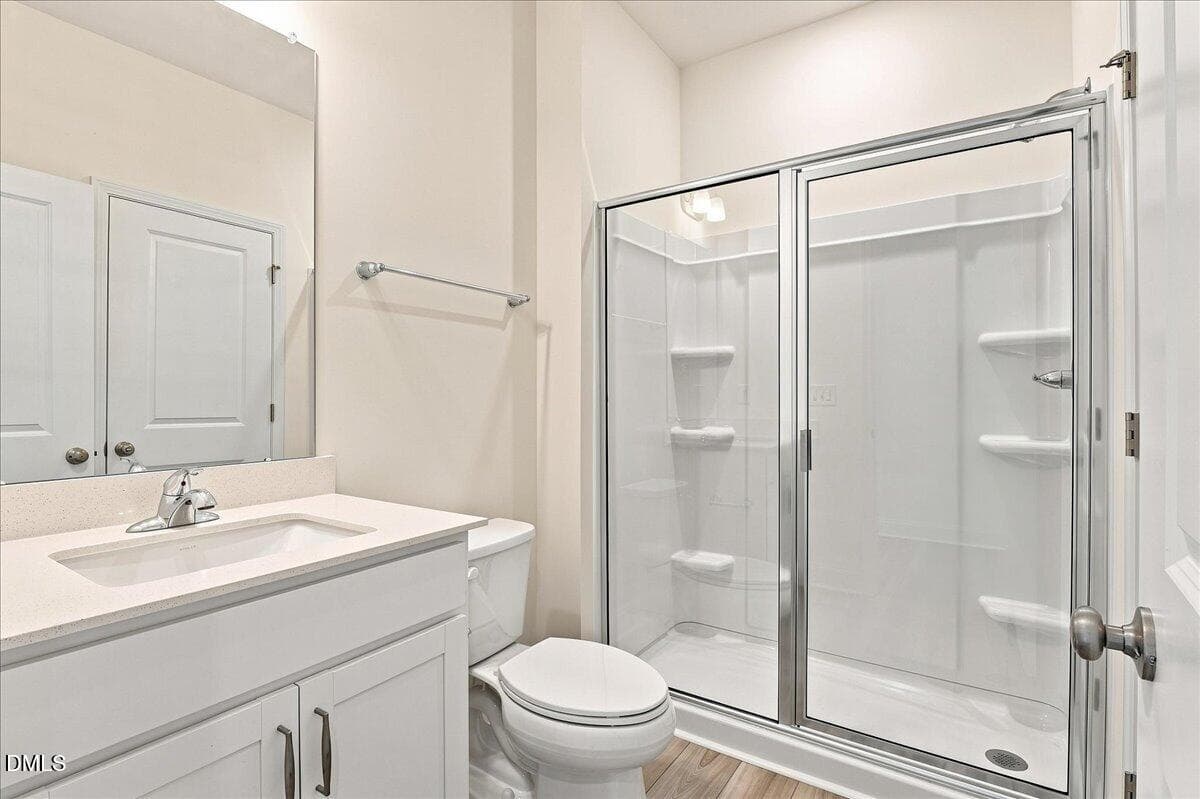 first floor full bathroom - 1420 Green Cypress Drive, Zebulon, NC 27597