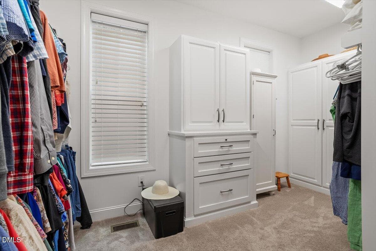 Clothes closet in owner's suite - 4235 Henderson Place, Pittsboro, NC 27312